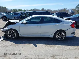 2017 Honda Civic EX-T with VIN 2HGFC1E39HH644602, listed as a IAAI auction lot 41920127 with 102,360 mi miles and . Bid and sale history available at DreamBid. Image 15.