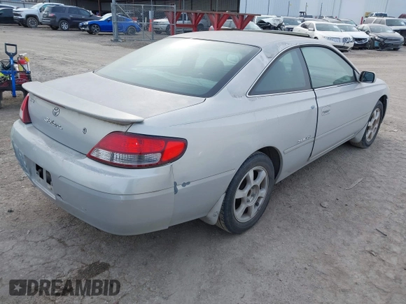 1999 Toyota Solara SE with VIN 2T1CF22P7XC106169, listed as a IAAI auction lot 41291391 with 297,339 mi miles. Bid and sale history available at carsss.com. Image 4.