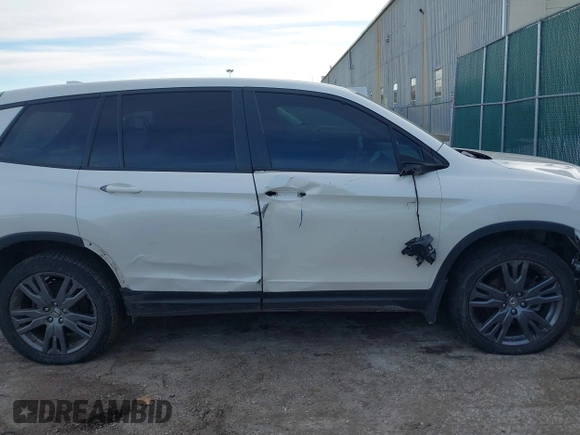 2019 Honda Passport EX-L with VIN 5FNYF8H5XKB008904, listed as a IAAI auction lot 41440706 with 57,317 mi miles and . Bid and sale history available at DreamBid. Image 13.