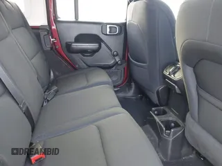 2021 Jeep Wrangler Unlimited Willys with VIN 1C4HJXDN6MW815448, listed as a IAAI auction lot 41459304 with 52,474 mi miles and . Bid and sale history available at DreamBid. Image 8.
