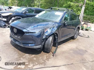 2018 Mazda CX-5 Grand Touring with VIN JM3KFBDM2J0373386, listed as a IAAI auction lot 42200795 with 70,111 mi miles and . Bid and sale history available at DreamBid. Image 18.