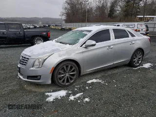 2013 Cadillac XTS with VIN 2G61N5S33D9191521, listed as a Copart auction lot 46104075 with 201,346 mi miles and Salvage Title. Bid and sale history available at carsss.com. Image 1.