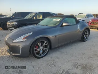 2014 Nissan 370Z Touring with VIN JN1AZ4FH4EM620092, listed as a Copart auction lot 77439254 with 38,662 mi miles and Salvage Title. Bid and sale history available at DreamBid. Image 1.