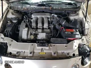 1999 Ford Taurus SE with VIN 1FAFP53S6XA242981, listed as a Copart auction lot 43211425 with 111,966 mi miles and Salvage title. Bid and sale history available at DreamBid. Image 11.