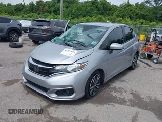 2018 Honda Fit EX with VIN 3HGGK5H81JM718009, listed as a IAAI auction lot 42337583 with 128,140 mi miles and . Bid and sale history available at DreamBid. Image 2.