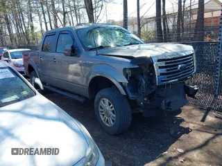 2014 Ford F-150 XL with VIN 1FTFW1EF9EKF61918, listed as a IAAI auction lot 41864650 with 217,839 mi miles. Bid and sale history available at carsss.com. Image 1.