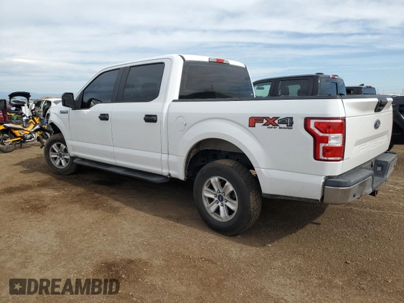 2018 Ford F-150 XL with VIN 1FTEW1E50JFC65370, listed as a Copart auction lot 59222655 with 213,487 mi miles and Salvage title. Bid and sale history available at DreamBid. Image 2.