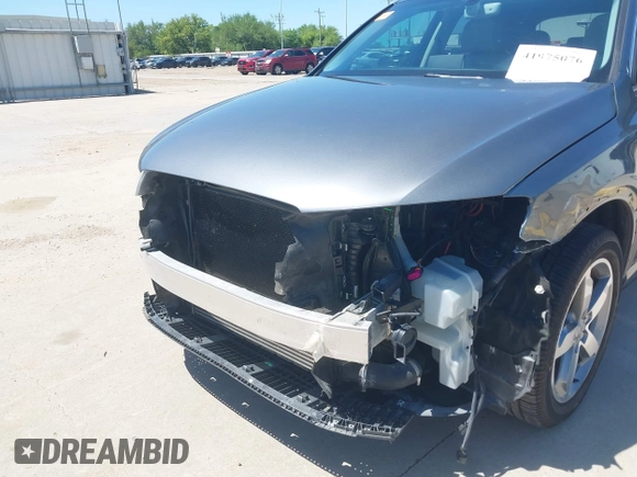 2015 Audi Q3 Prestige with VIN WA1GFCFS7FR013818, listed as a IAAI auction lot 41975076 with 60,295 mi miles and . Bid and sale history available at DreamBid. Image 6.
