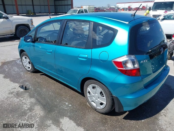 2013 Honda Fit with VIN JHMGE8H31DC061809, listed as a IAAI auction lot 41884724 with 10,713 mi miles. Bid and sale history available at carsss.com. Image 3.