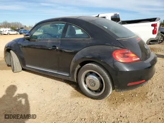 2012 Volkswagen Beetle 2.5L w/Sun/Sound/Nav PZEV with VIN 3VWHP7ATXCM647942, listed as a Copart auction lot 89161045 with 91,532 mi miles and Salvage Title. Bid and sale history available at carsss.com. Image 2.