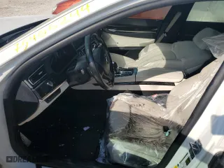 2013 BMW 7 Series 740Li with VIN WBAYE4C57DD137483, listed as a Copart auction lot 75406244 with 0 mi miles and Salvage Title. Bid and sale history available at carsss.com. Image 7.