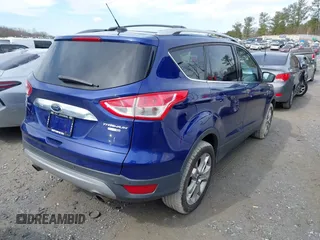 2016 Ford Escape Titanium with VIN 1FMCU9JXXGUA71898, listed as a IAAI auction lot 41758284 with 51,935 mi miles. Bid and sale history available at carsss.com. Image 4.