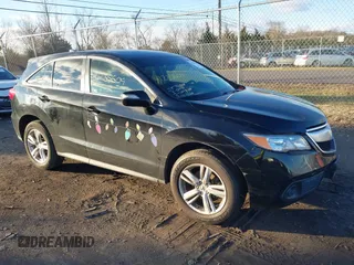 2013 Acura RDX with VIN 5J8TB4H3XDL019481, listed as a IAAI auction lot 41235509 with 129,024 mi miles. Bid and sale history available at carsss.com. Image 1.