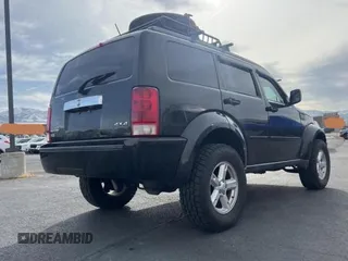 2008 Dodge Nitro SLT z VIN 1D8GU58K68W145253, wystawiony jako Copart lot #43768705 z przebiegiem 167 904 mil mil oraz Czysty tytuł • Clean title. Historia ofert i sprzedaży dostępna na DreamBid. Obrazek 4.