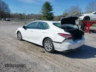 2020 Toyota Camry LE with VIN 4T1C11AK9LU315906, listed as a IAAI auction lot 41809360 with 97,401 mi miles. Bid and sale history available at carsss.com. Image 3.