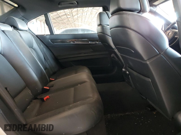 2012 BMW 7 Series 750Li с VIN WBAKB8C59CC852419, выставлен на аукционе Copart как лот 53736305 с пробегом 150 224 миль миль и Списание • Salvage title. История ставок и продаж доступна на DreamBid. Изображение 10.