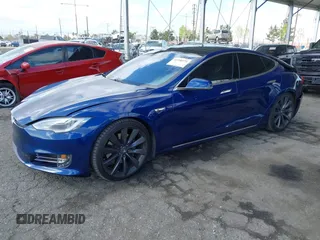 2016 Tesla Model S 90D with VIN 5YJSA1E22GF154873, listed as a IAAI auction lot 41950274 with 82,649 mi miles and . Bid and sale history available at DreamBid. Image 17.