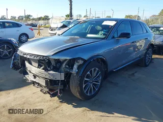 2024 Cadillac LYRIQ Sport z VIN 1GYKPTRL7RZ110193, wystawiony jako IAAI lot #41681140 z przebiegiem 14 218 mil mil oraz . Historia ofert i sprzedaży dostępna na DreamBid. Obrazek 19.