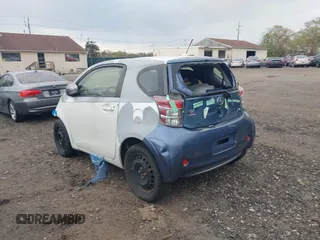2013 Scion iQ with VIN JTNJJXB06DJ022801, listed as a IAAI auction lot 42152740 with Not provided miles and . Bid and sale history available at DreamBid. Image 3.
