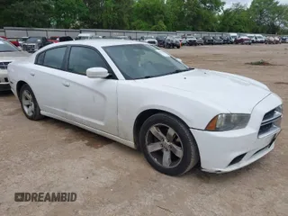 2014 Dodge Charger SE with VIN 2C3CDXBG4EH186881, listed as a IAAI auction lot 41952966 with 206,057 mi miles and . Bid and sale history available at DreamBid. Image 1.