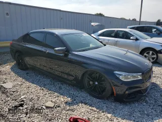 2017 BMW 7 Series with VIN WBA7F2C39HG423187, listed as a Copart auction lot 71163584 with 148,229 mi miles and Non Repairable. Bid and sale history available at DreamBid. Image 4.