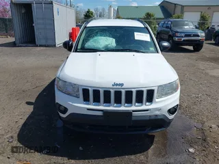 2012 Jeep Compass Sport with VIN 1C4NJDBB1CD588884, listed as a IAAI auction lot 41918765 with 199,008 mi miles. Bid and sale history available at carsss.com. Image 12.