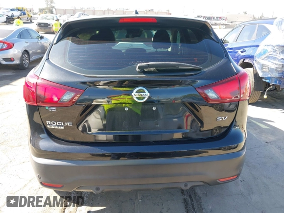 2019 Nissan Rogue Sport S with VIN JN1BJ1CPXKW233049, listed as a IAAI auction lot 42004455 with 63,427 mi miles. Bid and sale history available at carsss.com. Image 16.