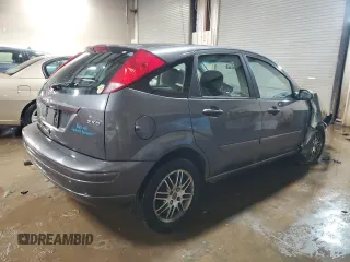 2005 Ford Focus S with VIN 3FAFP37N05R120564, listed as a Copart auction lot 49404935 with 102,254 mi miles and Salvage Title. Bid and sale history available at carsss.com. Image 3.