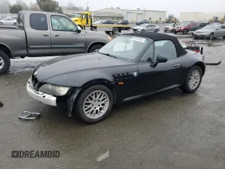 1999 BMW Z3 2.5L with VIN 4USCH9337XLF81888, listed as a Copart auction lot 86134164 with 146,806 mi miles and Salvage Title. Bid and sale history available at carsss.com. Image 1.