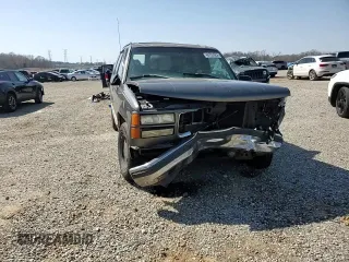 1999 GMC Yukon with VIN 1GKEC13R9XJ805842, listed as a Copart auction lot 48952625 with 259,149 mi miles and Clean Title. Bid and sale history available at carsss.com. Image 12.