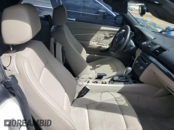 2013 BMW 1 Series 128i z VIN WBAUL7C54DVU10072, wystawiony jako Copart lot #73754044 z przebiegiem Nie podano mil oraz Nie do naprawy • Non repairable. Historia ofert i sprzedaży dostępna na DreamBid. Obrazek 7.