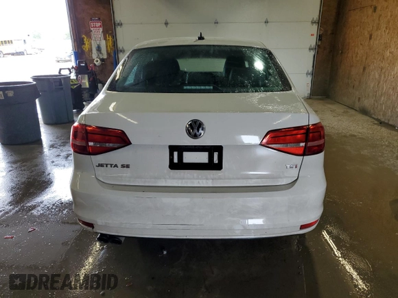 2015 Volkswagen Jetta SE with VIN 3VWD17AJ4FM308693, listed as a Copart auction lot 59987585 with 87,136 mi miles and Salvage title. Bid and sale history available at DreamBid. Image 6.