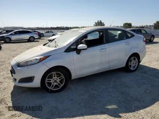 2017 Ford Fiesta SE z VIN 3FADP4BJ2HM136056, wystawiony jako Copart lot #60490905 z przebiegiem 141 469 mil mil oraz Czysty tytuł • Clean title. Historia ofert i sprzedaży dostępna na DreamBid. Obrazek 1.