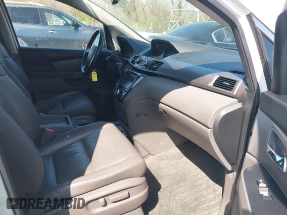 2016 Honda Odyssey EX-L with VIN 5FNRL5H68GB160563, listed as a IAAI auction lot 41962881 with 121,429 mi miles. Bid and sale history available at carsss.com. Image 5.