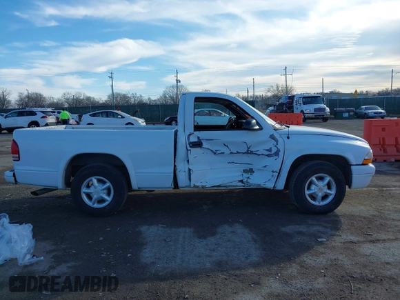 2000 Dodge Dakota SLT with VIN 1B7GL26Z7YS708253, listed as a IAAI auction lot 41402953 with 103,461 mi miles and . Bid and sale history available at DreamBid. Image 13.