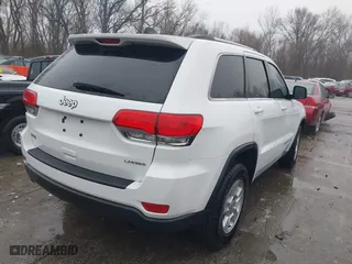 2014 Jeep Grand Cherokee Laredo with VIN 1C4RJEAG0EC510545, listed as a IAAI auction lot 41434776 with 141,789 mi miles. Bid and sale history available at carsss.com. Image 4.