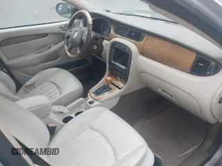 2004 Jaguar X-Type z VIN SAJEA51CX4WE01300, wystawiony jako IAAI lot #42514993 z przebiegiem 95 525 mil mil oraz . Historia ofert i sprzedaży dostępna na DreamBid. Obrazek 5.