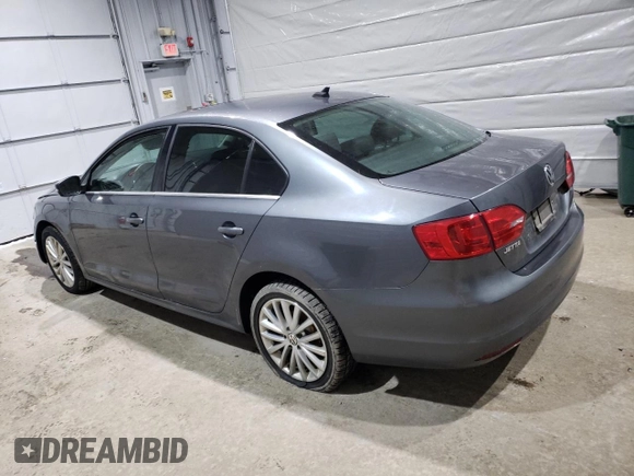 2012 Volkswagen Jetta SEL with VIN 3VWLP7AJ2CM412024, listed as a Copart auction lot 48194955 with 178,268 mi miles and Salvage title. Bid and sale history available at DreamBid. Image 2.