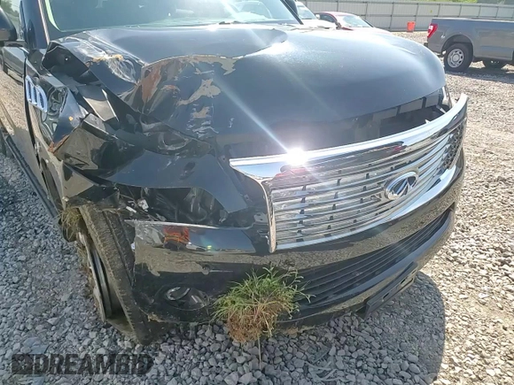 2012 Infiniti QX56 8-passenger with VIN JN8AZ2ND2C9716291, listed as a Copart auction lot 71990704 with 79,241 mi miles and Salvage Title. Bid and sale history available at carsss.com. Image 12.