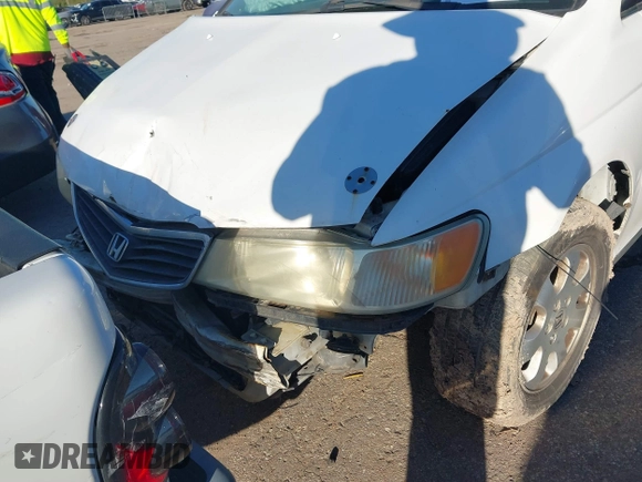 2002 Honda Odyssey EX z VIN 2HKRL18602H522128, wystawiony jako IAAI lot #40879648 z przebiegiem Nie podano mil oraz . Historia ofert i sprzedaży dostępna na DreamBid. Obrazek 6.