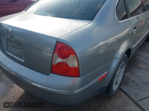 2004 Volkswagen Passat GLX z VIN WVWRH63B44P197011, wystawiony jako IAAI lot #42019610 z przebiegiem 151 540 mil mil oraz . Historia ofert i sprzedaży dostępna na DreamBid. Obrazek 12.
