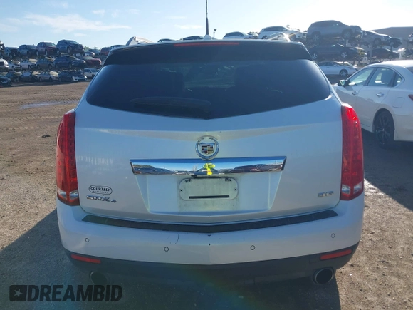 2013 Cadillac SRX Premium Collection with VIN 3GYFNJE32DS644094, listed as a IAAI auction lot 42513106 with 122,572 mi miles and . Bid and sale history available at DreamBid. Image 16.