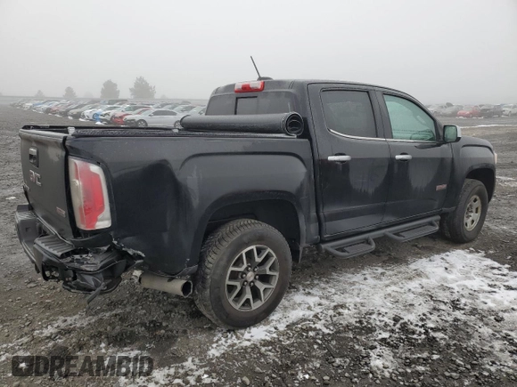 2016 GMC Canyon z VIN 1GTP6CE17G1380605, wystawiony jako Copart lot #88750975 z przebiegiem 102 571 mil mil oraz Szkoda całkowita • Salvage title. Historia ofert i sprzedaży dostępna na DreamBid. Obrazek 3.