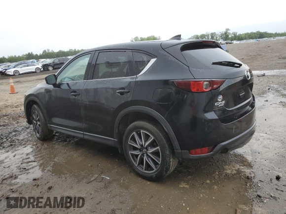2018 Mazda CX-5 Touring z VIN JM3KFBCM4J0377280, wystawiony jako Copart lot #56688575 z przebiegiem 101 167 mil mil oraz Czysty tytuł • Clean title. Historia ofert i sprzedaży dostępna na DreamBid. Obrazek 2.