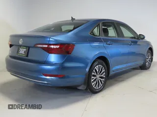2021 Volkswagen Jetta S z VIN 3VWC57BU9MM003499, wystawiony jako Copart lot #42794495 z przebiegiem 67 639 mil mil oraz Czysty tytuł • Clean title. Historia ofert i sprzedaży dostępna na DreamBid. Obrazek 3.