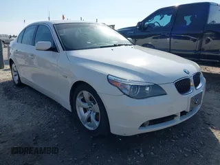 2007 BMW 5 Series 525i with VIN WBANE53527CW62776, listed as a IAAI auction lot 41870614 with 180,886 mi miles and . Bid and sale history available at carsss.com. Image 1.