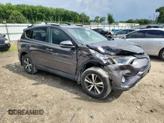 2016 Toyota RAV4 XLE with VIN 2T3RFREV4GW478667, listed as a Copart auction lot 64580095 with 70,593 mi miles and Salvage title. Bid and sale history available at DreamBid. Image 4.