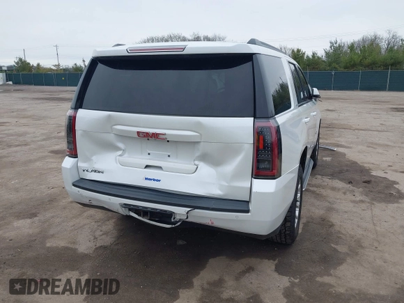 2016 GMC Yukon SLT with VIN 1GKS2BKC5GR374815, listed as a IAAI auction lot 41889495 with 163,464 mi miles. Bid and sale history available at carsss.com. Image 4.