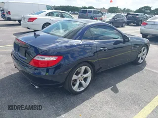 2013 Mercedes-Benz SLK 350 z VIN WDDPK5HA8DF054593, wystawiony jako IAAI lot #41821009 z przebiegiem 148 571 mil mil oraz . Historia ofert i sprzedaży dostępna na DreamBid. Obrazek 4.