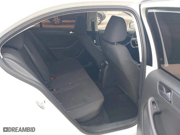 2015 Volkswagen Jetta Sedan 2.0L S with VIN 3VW2K7AJ1FM404527, listed as a IAAI auction lot 41404880 with 142,699 mi miles. Bid and sale history available at carsss.com. Image 8.